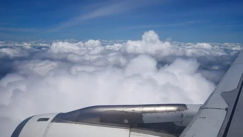 A view from the airplane window over the wings and engines. The planes are fl Stock Footage 80106525