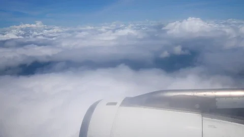 A view from the airplane window over the wings and engines. The planes are fl Stock Footage 80106567