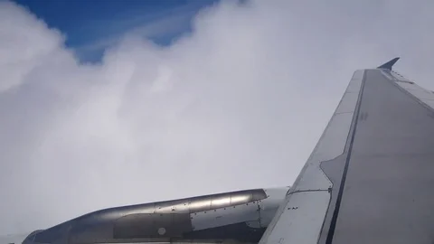 A view from the airplane window over the wings and engines. The planes are fl Stock Footage 80106745