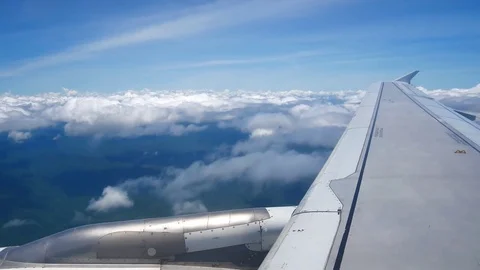 A view from the airplane window over the wings and engines. The planes are fl Stock Footage 80106813