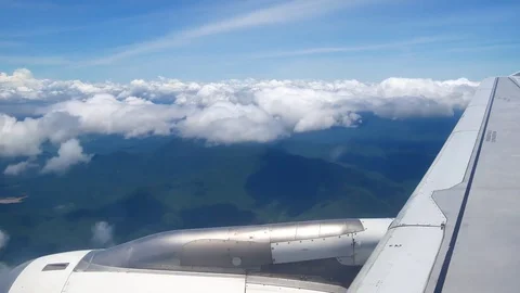 A view from the airplane window over the wings and engines. The planes are fl Stock Footage 80106896