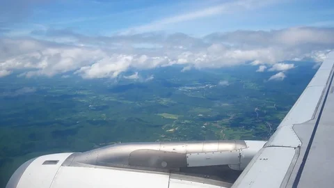 A view from the airplane window over the wings and engines. The planes are fl Stock Footage 80106989