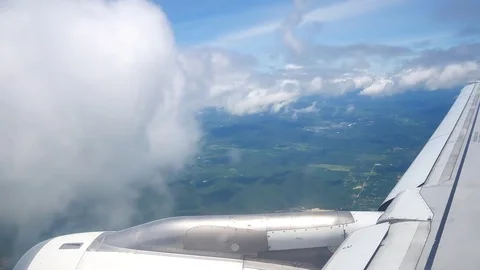 A view from the airplane window over the wings and engines. The planes are fl Stock Footage 80107038