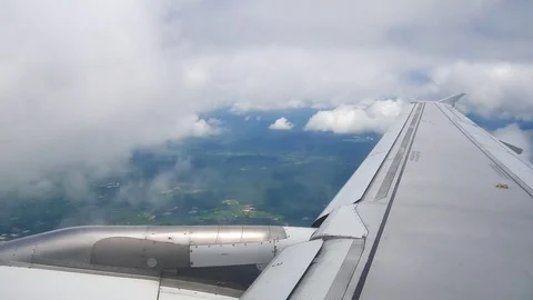 A view from the airplane window over the wings and engines. The planes are fl Stock Footage 80107105