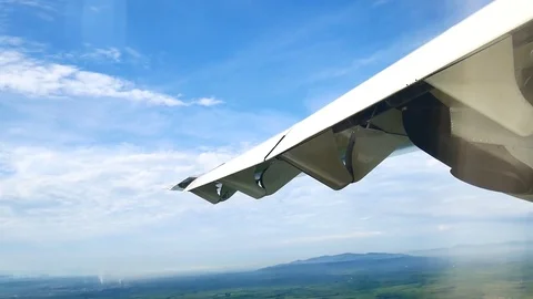 A view from the airplane window over the wings and engines. The planes are fl Stock Footage 81345180