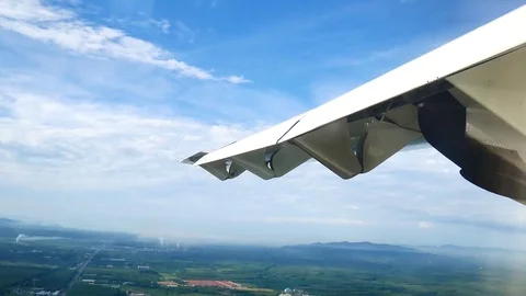 A view from the airplane window over the wings and engines. The planes are fl Stock Footage 81345204