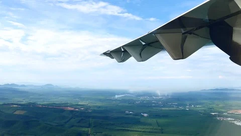 A view from the airplane window over the wings and engines. The planes are fl Stock Footage 81345229