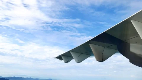 A view from the airplane window over the wings and engines. The planes are fl Stock Footage 81345254