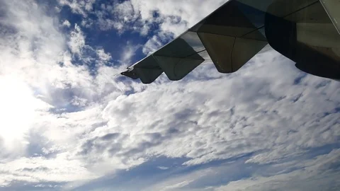 A view from the airplane window over the wings and engines. The planes are fl Stock Footage 81345280