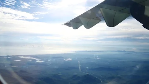 A view from the airplane window over the wings and engines. The planes are fl Stock Footage 81345302
