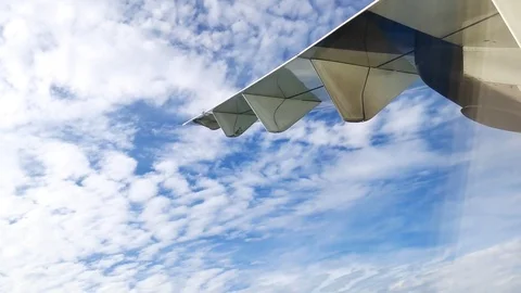 A view from the airplane window over the wings and engines. The planes are fl Stock Footage 81345326