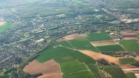 View from an airplane window of a picturesque spring landscape. Stock-Footage 311936069