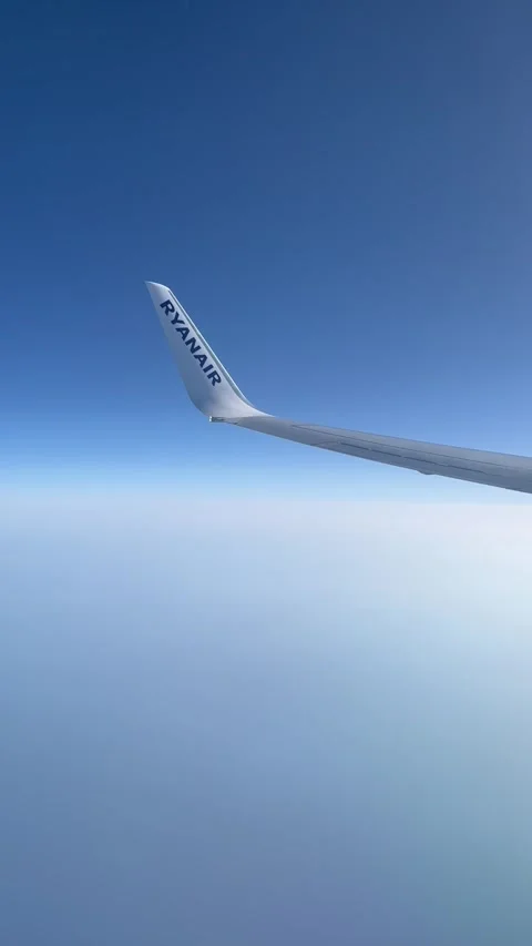 View from the airplane window on Ryanair Airplane Wing. Stock Footage 282240701