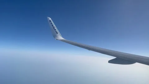 View from the airplane window on Ryanair Airplane Wing. Stock Footage 282240722