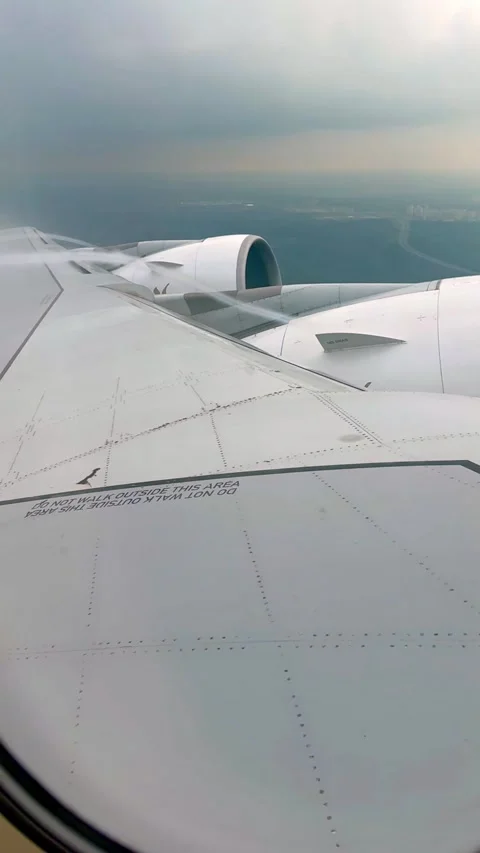 View from airplane window showing wingtip vortex during flight. Visible air Stock Footage 306926269
