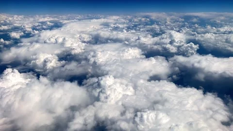 View from airplane window to the sky and clouds from above. Stock Footage 310522161