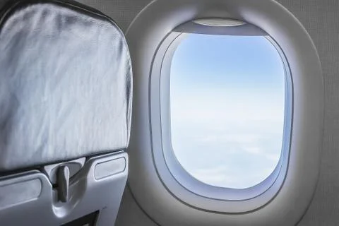View from an airplane window at the sky Stock Photos