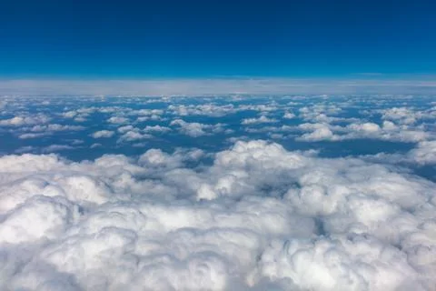 View from airplane window to the sky. Stock Photos