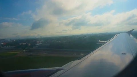 A view from airplane window with some scratch on the window Stock Footage 82575681
