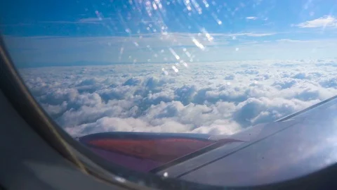 A view from airplane window with some scratch on the window Stock Footage 82576571