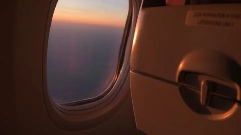 View from the airplane window at sunset. Stock Footage 183266589
