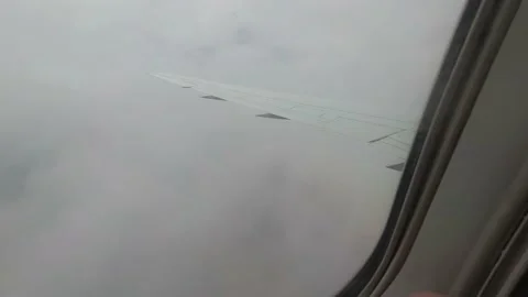 View from the airplane window with turbulence Stock Footage 132611485