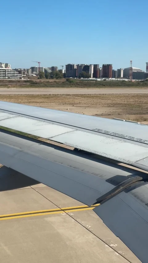 View from airplane window while taxiing on the runway before takeoffsee the t Stock Footage 321764006