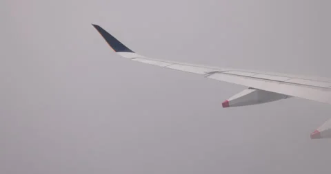 View from airplane window while travelling from Bangkok to Singapore. Video stock 247425785