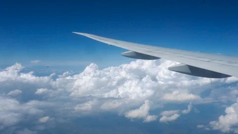 View from airplane window. Wing of an airplane. above the clouds Stock Footage 115172029