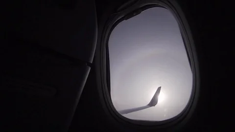 View from the airplane window on the wing and the sky at high altitude. Flight Stock Footage 115702974