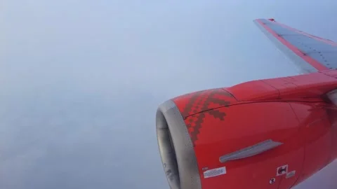 View from the airplane window of the wing and clouds in the sky Video stock 167160006