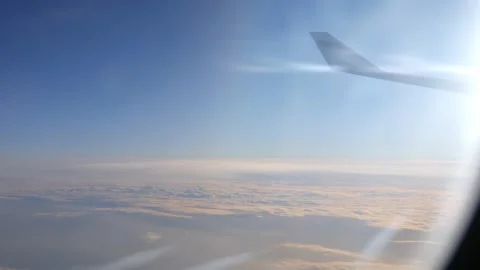 View from the Airplane Window, Wing and Icy Window Close Stock Footage 231021044
