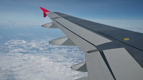 View from airplane window with wing and panoramic view 스톡 동영상 234833654