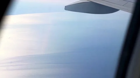 View from the airplane window to the wing. Good weather outside. Clouds in the Stock Footage 172269334