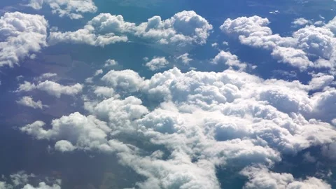View from the airplane window to the wing. Good weather outside. Clouds in the Stock Footage 172379979