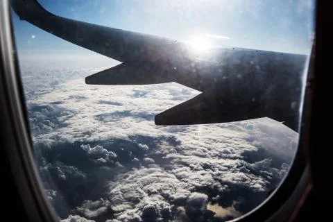View from airplane window on the wing . Stock Photos