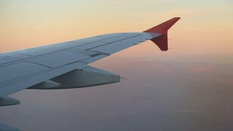 View From Airplane Window Of Wing Sunset Pink Sky Right To Left 스톡 동영상 102502103