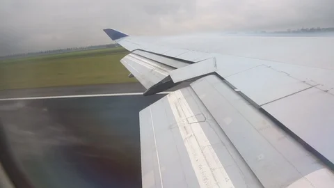 View From Airplane Window Of Wing Takeoff Rain Left To Right02 Stock Footage 102502696