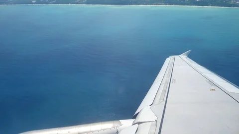 A view from the airplane windowafter take off  over the wings and engines. Th Stock Footage 80105534