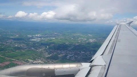 A view from the airplane windowafter take off  over the wings and engines. Th Stock Footage 80107258