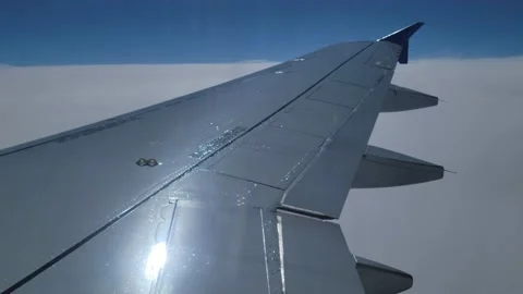 View from airplane wing on a cloudy day. Stock-Footage 236427671