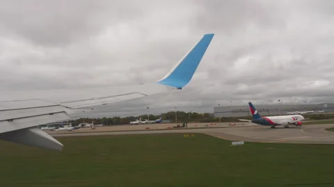 View of an airplane wing during takeoff Stock Footage 285249794