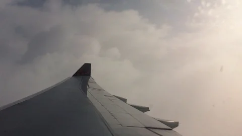 View of airplane wing in flight Stock Footage 111036911