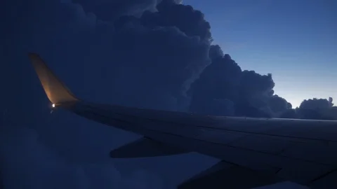 View airplane wing flying passthrough cumulonimbus cloud. Stock Footage 92928886