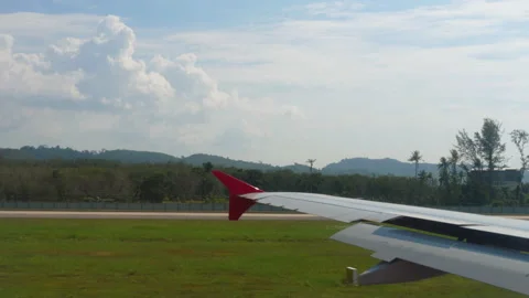 View of the airplane wing on the runway Stock Footage 158713085