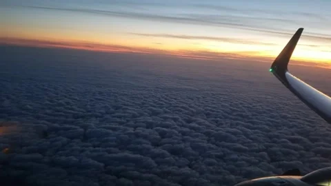 View of an airplane wing in the sky Stock Footage 254461842