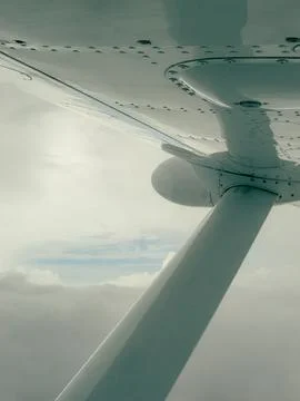 View of an airplane wing with visible rivets Stock Photos