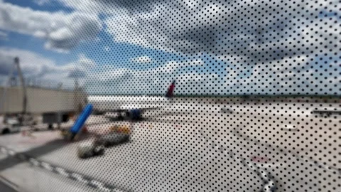 View of Airplanes and Luggage Loading at Airport Terminal 스톡 동영상 288902784