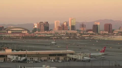 View Of An Airport; Cityscape in the Background Stock-Footage 19013944