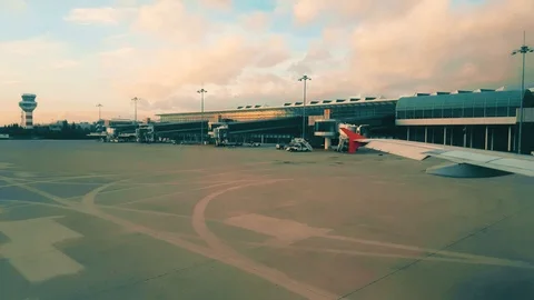 View of the airport from the plane window early in the morning Stock Footage 104410068